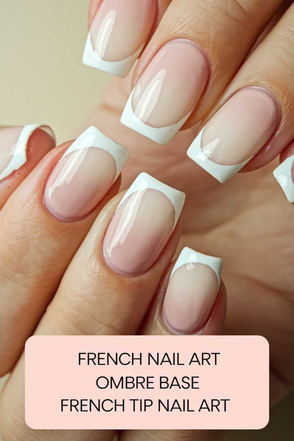 Close-up of a hand with French manicure nails. The nails have an ombre base transitioning from pink to nude, with classic white tips. Text overlay reads: French Nail Art, Ombre Base, French Tip Nail Art.