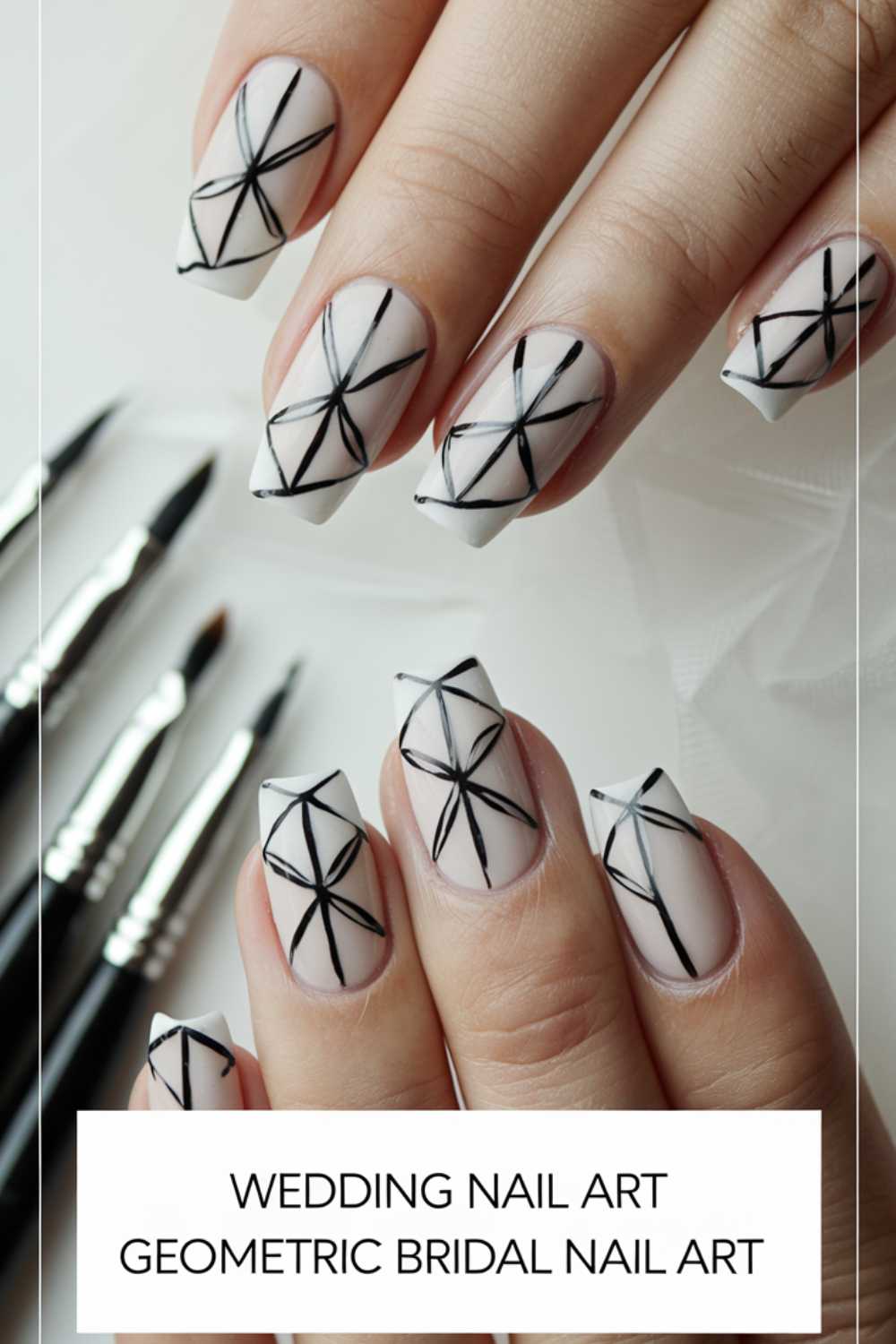 Fingers displaying white nails with black geometric line art. Four nail art brushes are laid out beside the hand. Text in the image reads: Wedding Nail Art Geometric Bridal Nail Art.