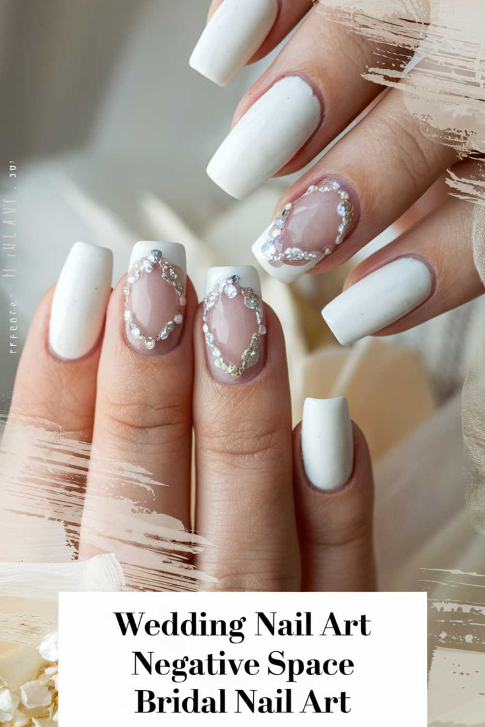 Close-up of a hand with wedding nail art. The design features white square-shaped nails with intricate negative space patterns adorned with pearl-like accents, creating an elegant bridal look. Text at the bottom reads: Wedding Nail Art Negative Space Bridal Nail Art.