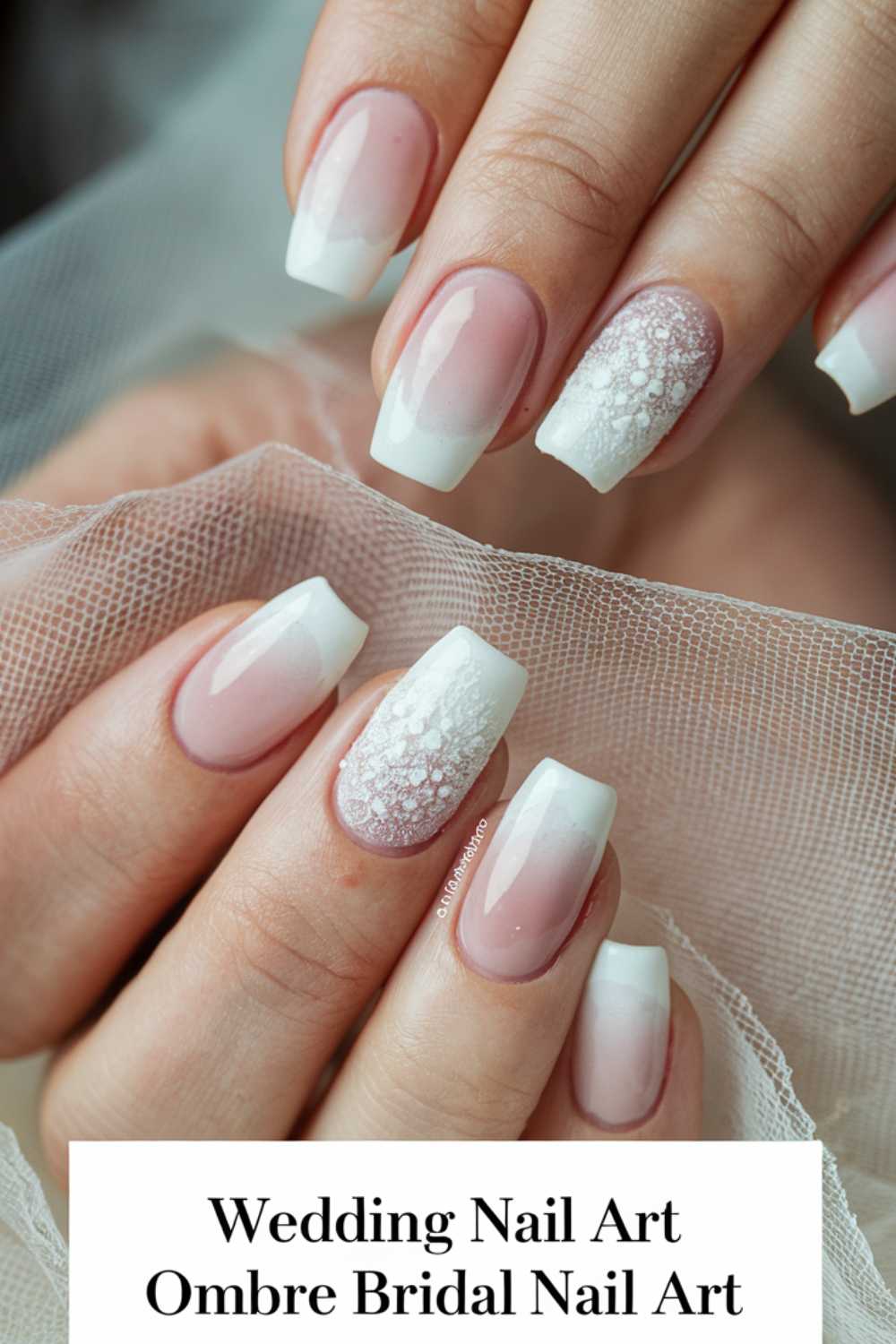 Close-up of hands with bridal nail art. Nails feature a French manicure with white tips, some with an ombre effect and lace-like texture. The background is a sheer fabric, and text says Wedding Nail Art Ombre Bridal Nail Art.