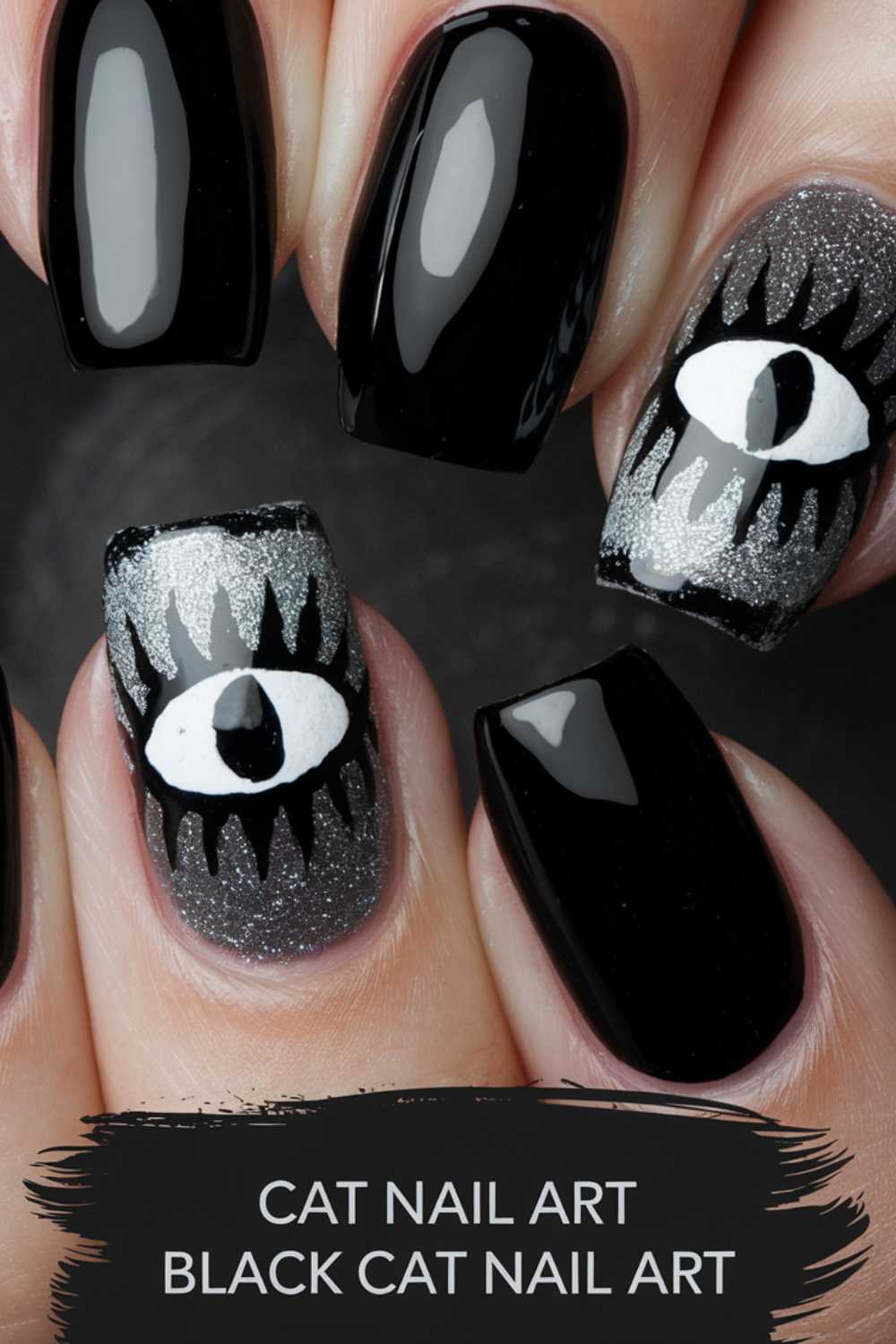Close-up of fingernails with black cat eye nail art. Two nails feature a silver background with a stylized black and white cat eye design, surrounded by jagged black shapes. The other nails are glossy black. Text reads Cat Nail Art Black Cat Nail Art at the bottom.