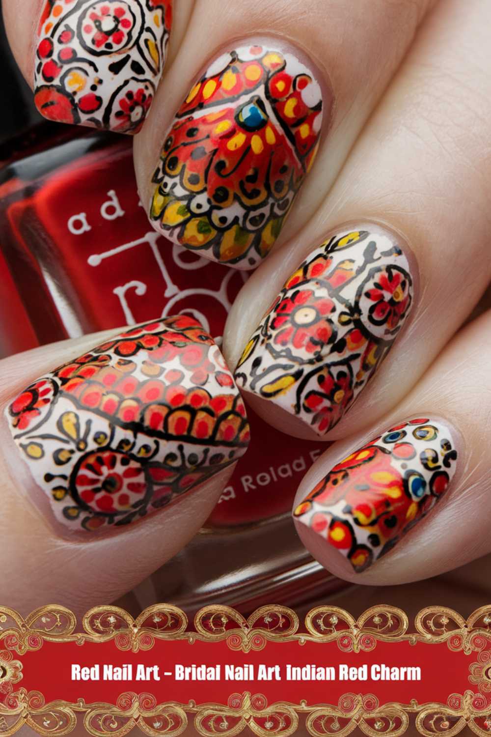 Close-up of intricately designed nails with red and yellow henna-inspired patterns and dots on a neutral base. Text at the bottom reads Red Nail Art - Bridal Nail Art Indian Red Charm against a decorative border.