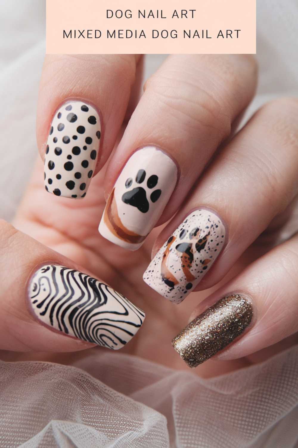 Close-up of a hand showcasing five fingernails adorned with unique dog-themed nail art, featuring polka dots, paw prints, abstract patterns, and glitter. Above the artistic display is the text: Dog Nail Art: Mixed Media Masterpiece.